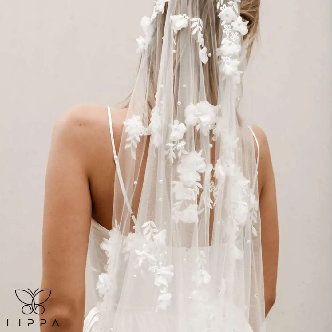 Bridal veil with comb for secure wear, perfect for weddings and engagements.